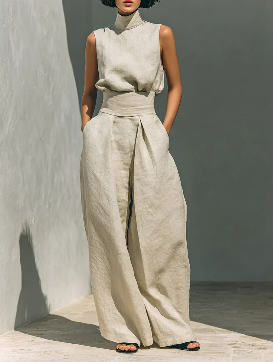 Conjunto compuesto por una blusa sin mangas y pantalones de pierna ancha en una mezcla de algodón y lino.